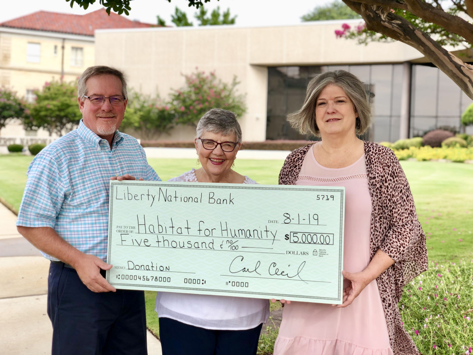 Community | Liberty National Bank donates to Habitat for Humanity